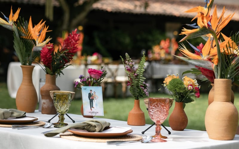 Tropical table with bird of paradise flowers